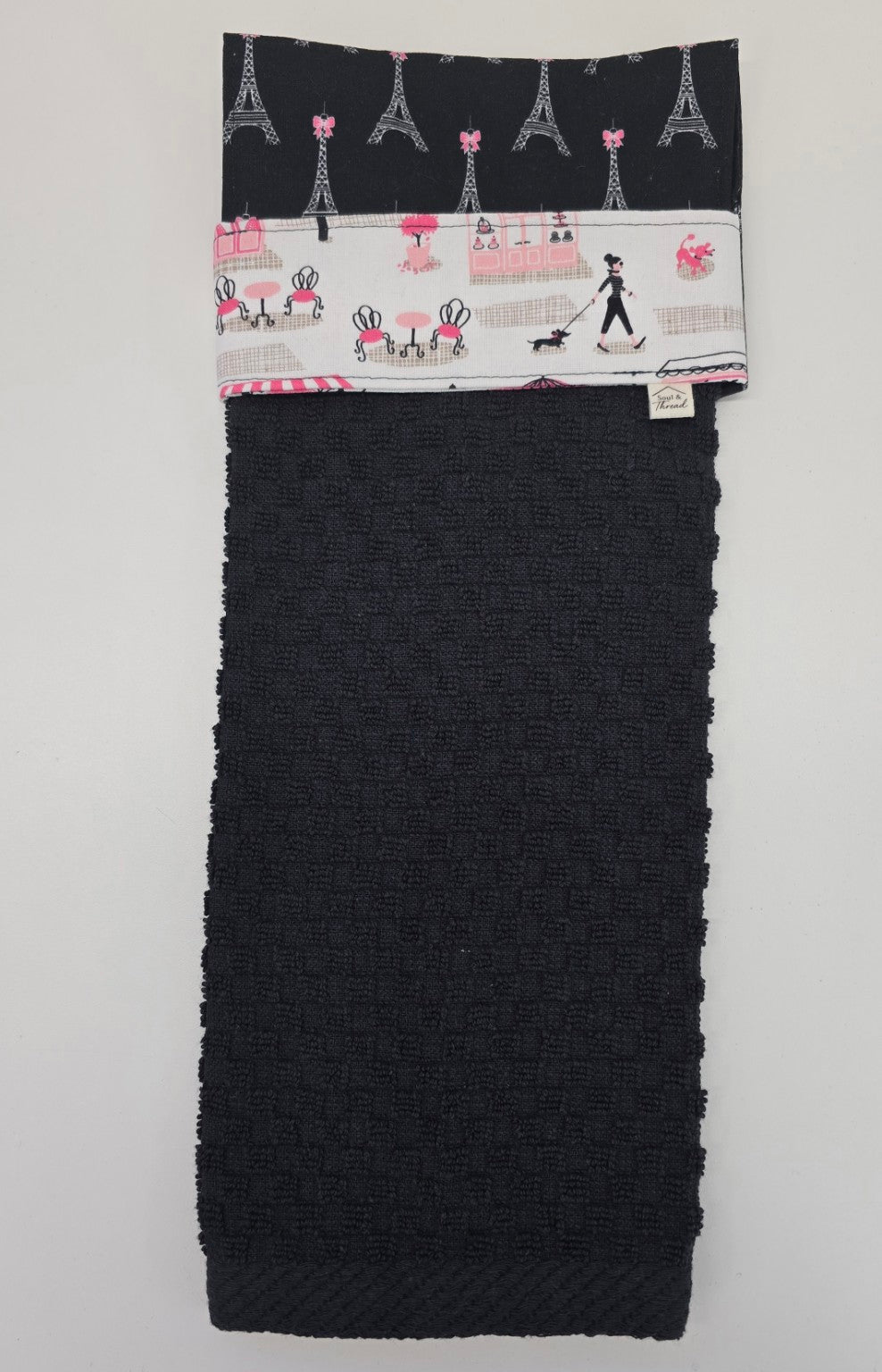 Black hanging towel with pink Paris café fabric band and Eiffel Tower topper
