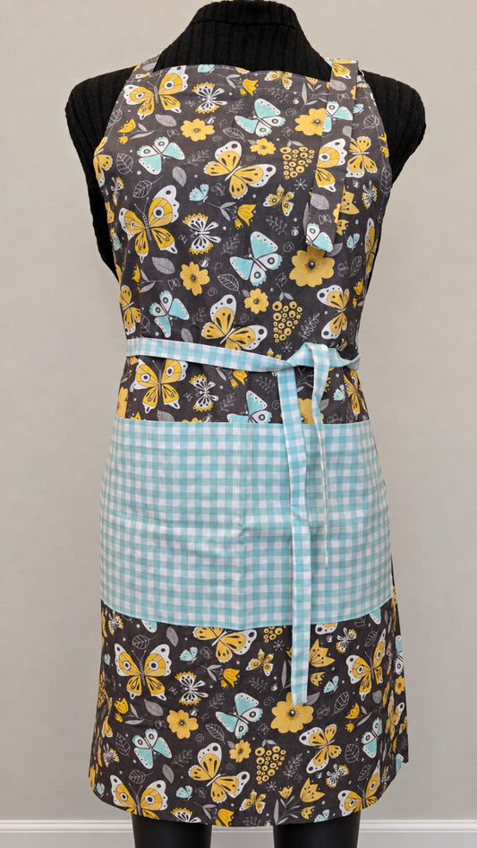 Flutter & Bloom handmade full-length apron with butterfly and floral print and aqua gingham pocket
